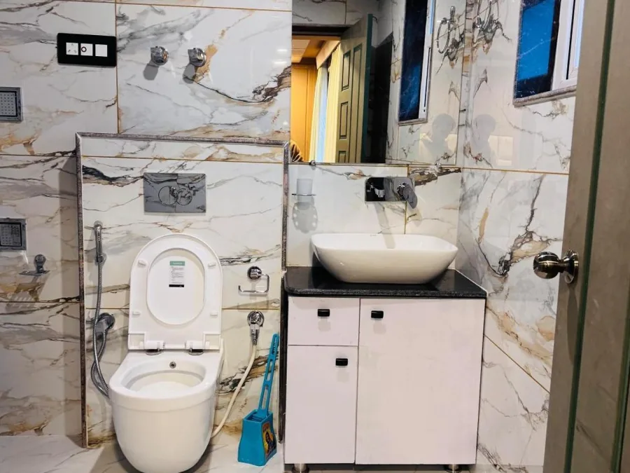 Bathroom at Hotel Seven Pahalgam with a washbasin and mirror