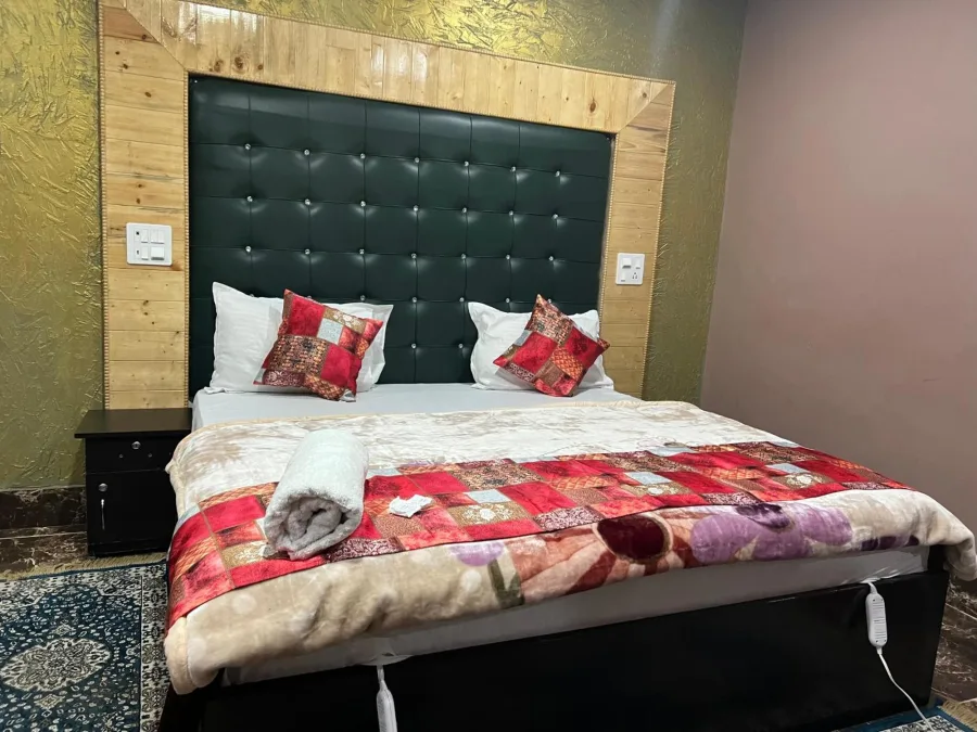 Guest room interior at Hotel Seven Pahalgam