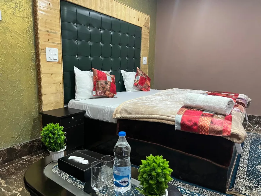 Guest room at Hotel Seven Pahalgam with a tea table