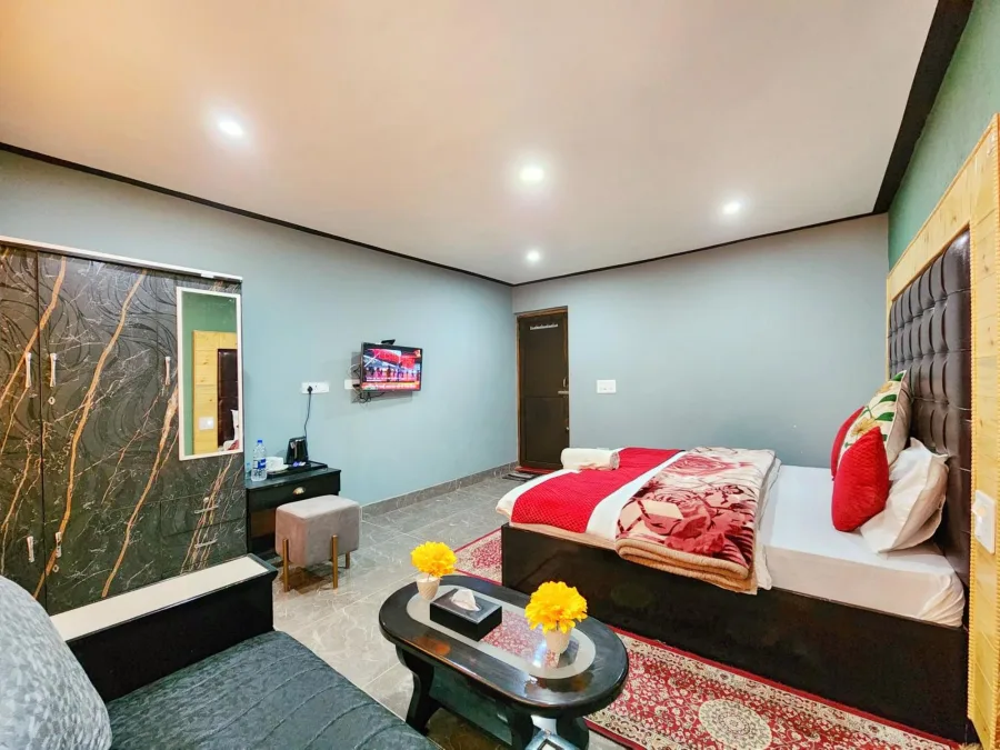 Guest room at Hotel Seven Pahalgam with a sitting area